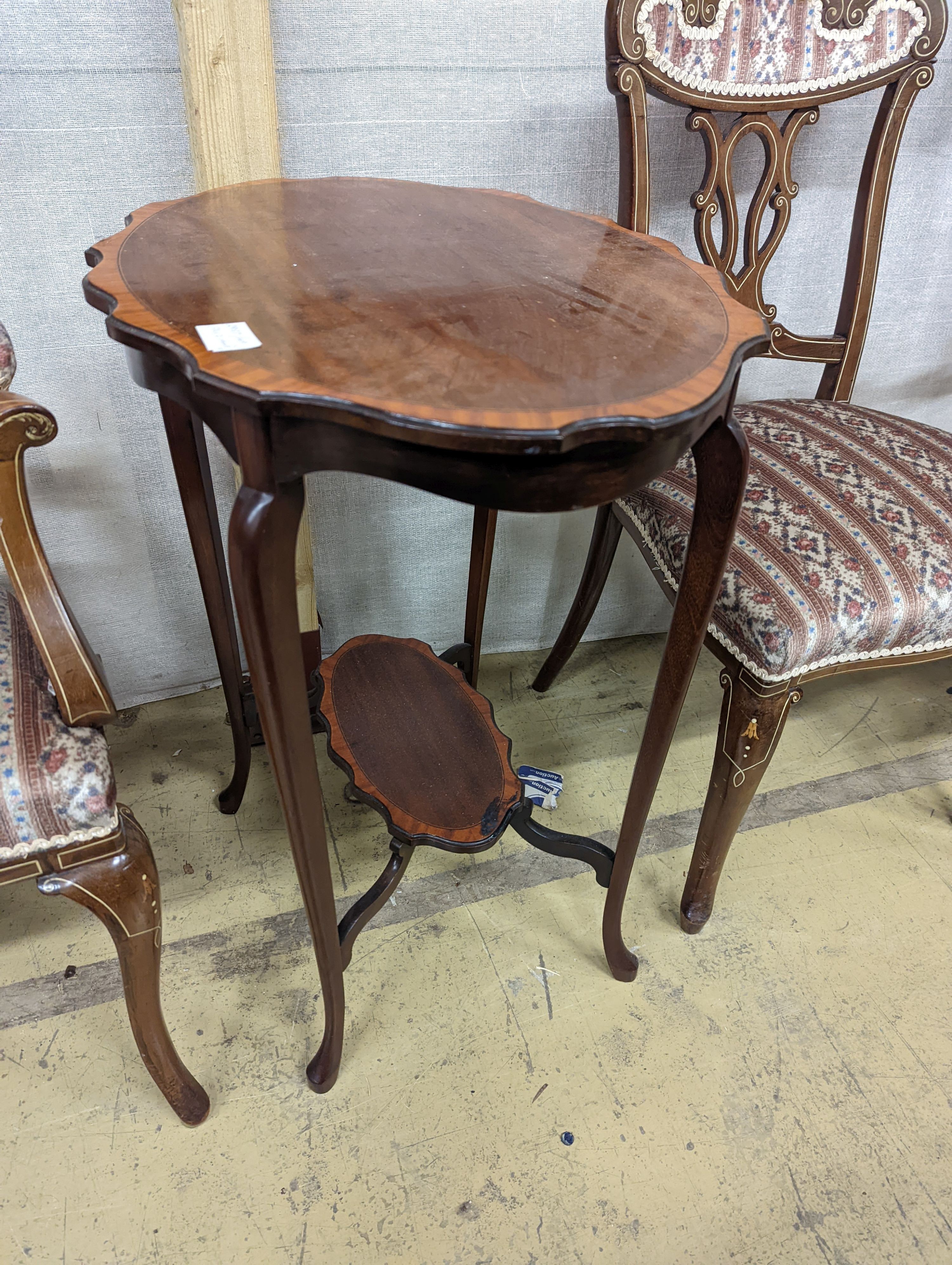 Three late Victorian bone inlaid mahogany chairs, two with arms, together with an Edwardian oval satinwood banded occasional table.